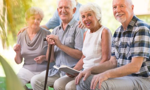 Smiling elderly people spending time together